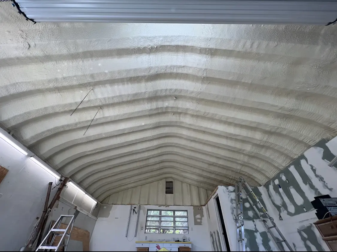 Spray polyurethane foam applied to the underside of a metal roof deck in Lakewood Ranch